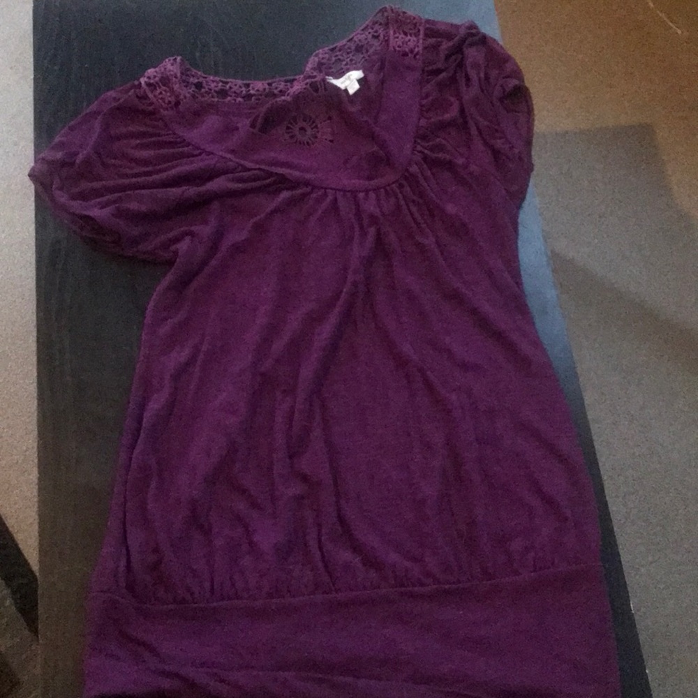 Purple swoop neck with flower opening on back